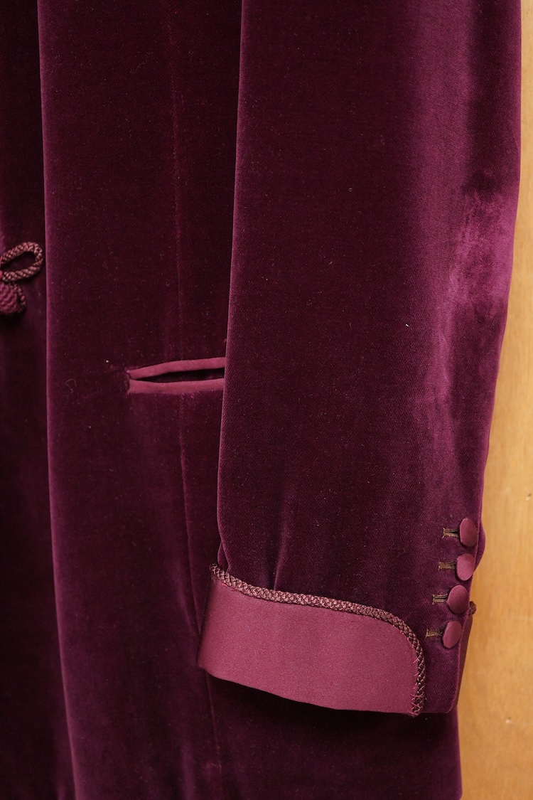 The property of a titled gentleman: A Redwood & Feller maroon velvet mid 20th century gentleman’s smoking jacket, with maroon silk cuff and collar detail, front chest 56cm.